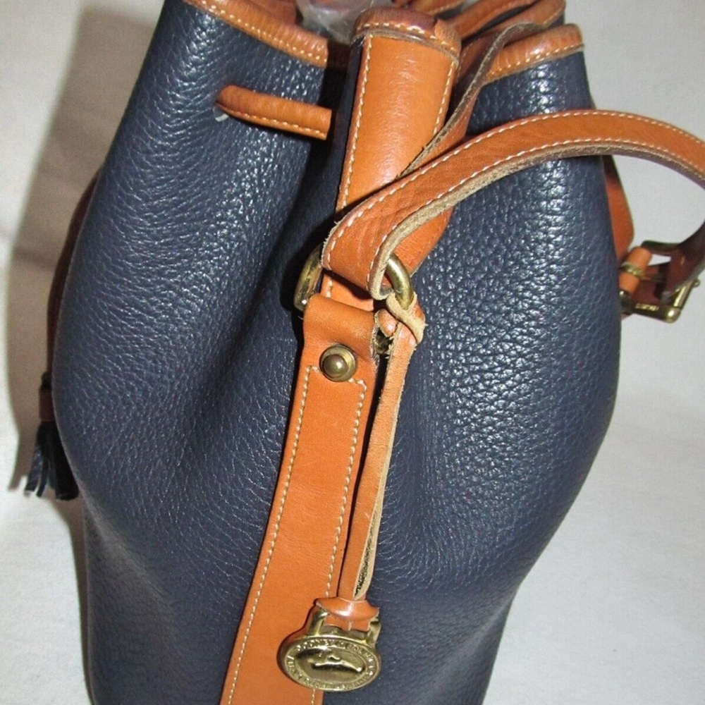 New Dooney & Burke Pebble Grain Leather
Drawstring Crossbody Bucket Bag. - Picture 15 of 16